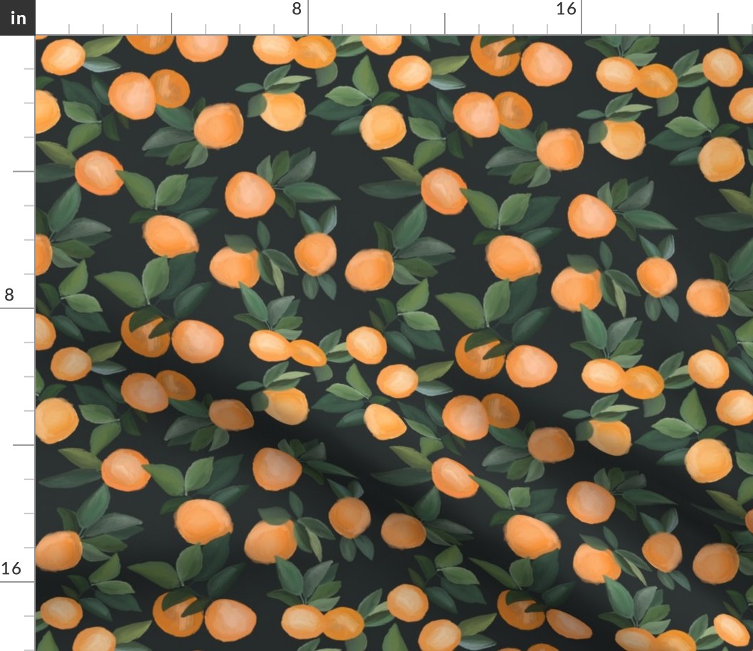 oranges scattered on soft black