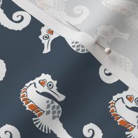 seahorses (blue, orange)