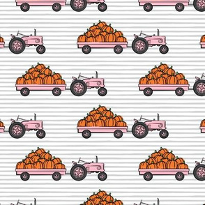 Pumpkin Patch - pink tractor (on stripes) pulling pumpkins - LAD19
