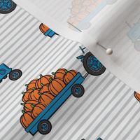 Pumpkin Patch -  blue tractor (on stripes) pulling pumpkins - LAD19