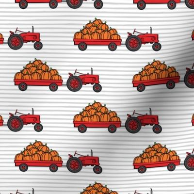 Pumpkin Patch - Red tractor (grey stripes) pulling pumpkins - LAD19
