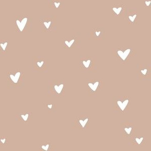 handdrawn mini hearts on soft taupe