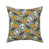 Skulls,Flowers,Pumpkins and Bats Halloween Fall Doodle on Olive Green