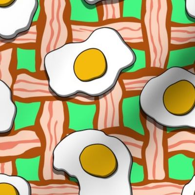 eggs and bacon on green
