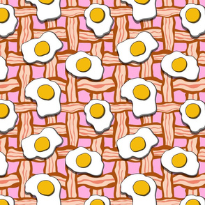 eggs and bacon on pink