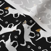 Tiny Trotting Color head white smooth coated Collies and paw prints - black