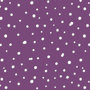 Hand drawn white polka dot on violet