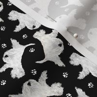 Tiny Trotting West Highland White Terriers and paw prints - black