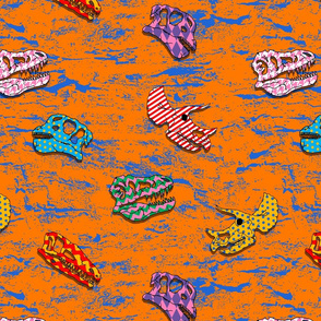 patterned dinosaur fossils on orange and blue