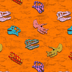 patterned dinosaur fossils on orange