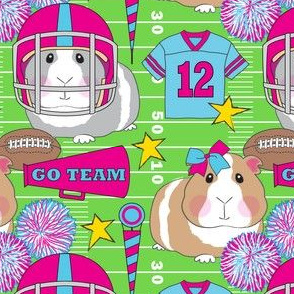 large fuchsia cheerleader and football guinea pigs