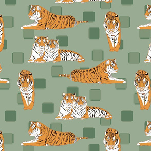 Tigers on green with geometric detail