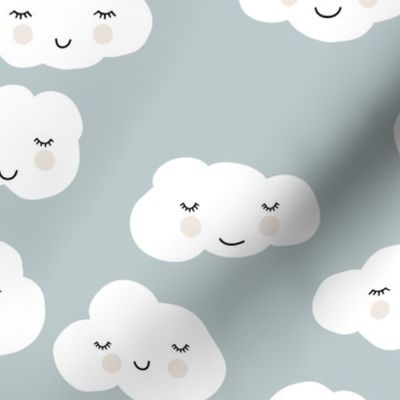 Sweet puffy clouds kawaii sky smiling sleepy cloud in cool dusty blue winter