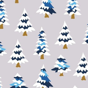 Blue pine trees with snow gray