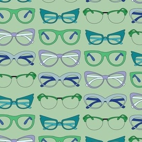 Retro spectacles on green