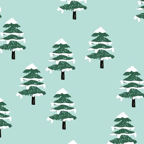 Woodland forest adventures snow winter wonderlands Christmas trees pine trees woods mint green