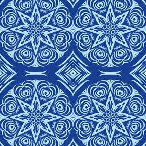 Tribal Star and Diamond Carvings of Baby Blue on Navy Blue