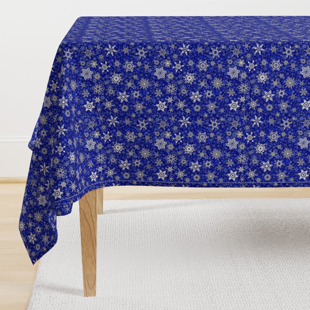 snowflakes - geometric designs on blue snowstorm