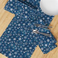 snowflakes - Christmas shapes on teal blue