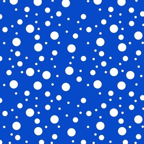 white varying polka dots on royal