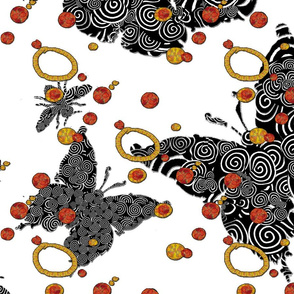 Bold White & Black Spiral Moths with Yellow & Orange circles