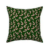 candy canes on dark green - LAD19