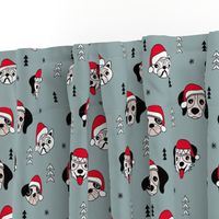 Little puppy friends Christmas dogs pug pitbull shepherd and poodle with santa hat winter stone gray blue