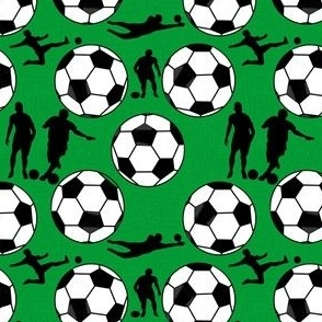 White Soccer Players and Balls on Green