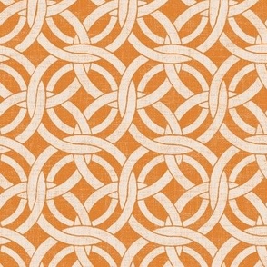 small lattice circle on orange in cream reverse linen