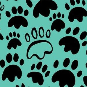 Cat paw prints on teal