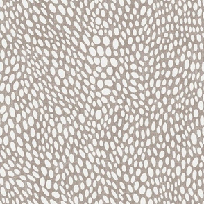 light dots on warm neutral with linen texture