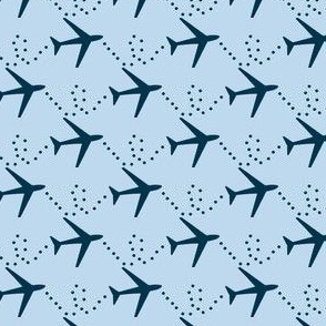 Airplanes in the sky:  Navy blue planes on light blue background