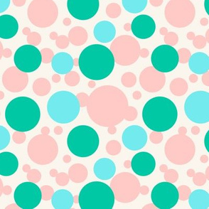 Green, blue and peach pink dots over beige