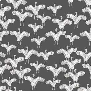 Hand drawn birds - white on charcoal - flock of cranes