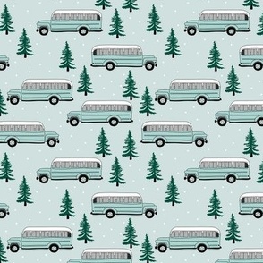 Vintage school bus ride winter mountain peak travels pine tree forest canada theme mint green