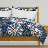 Modern patchwork cheater quilt with Dresden plate block