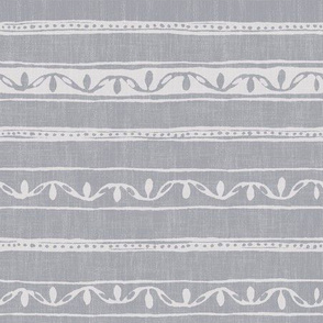 small lines and dots on gray linen