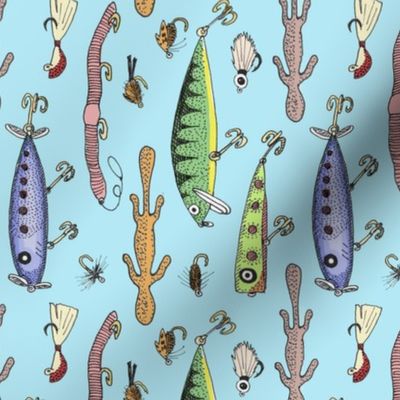 Fishing lures on blue tea towel