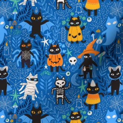 Spooky happy Halloween black cats.  
