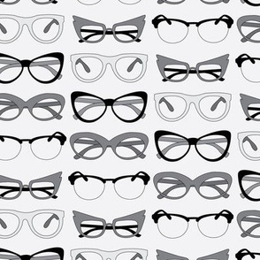 Retro spectacles on light grey
