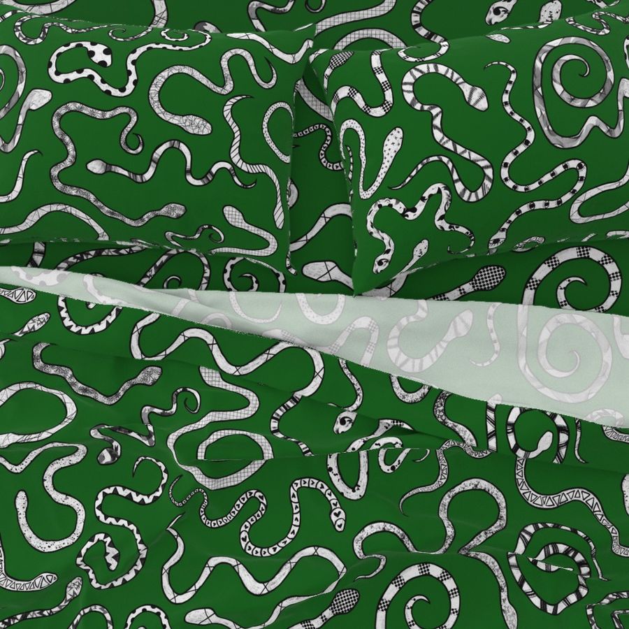 Green and white fancy snakes