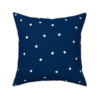 Small beige dots over blue