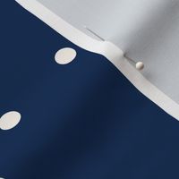 Small beige dots over blue