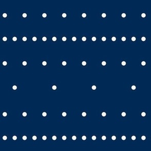 Aligned beige dots over dark blue