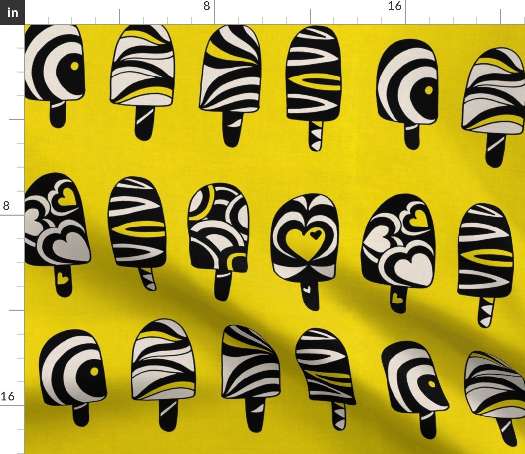 Black and  White Ice pops on yellow