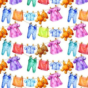 Baby clothes and Teddy bears on a rope