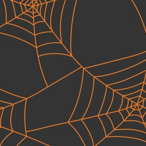 Spiderwebs pumpkin orange on black night - jumbo scale