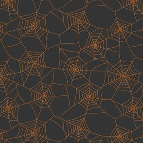 Spiderwebs pumpkin orange on black night - medium scale
