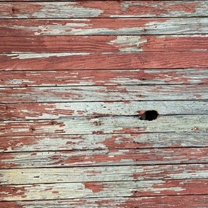 Faded red barn boards