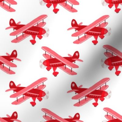 Red Bi-Wing Airplanes